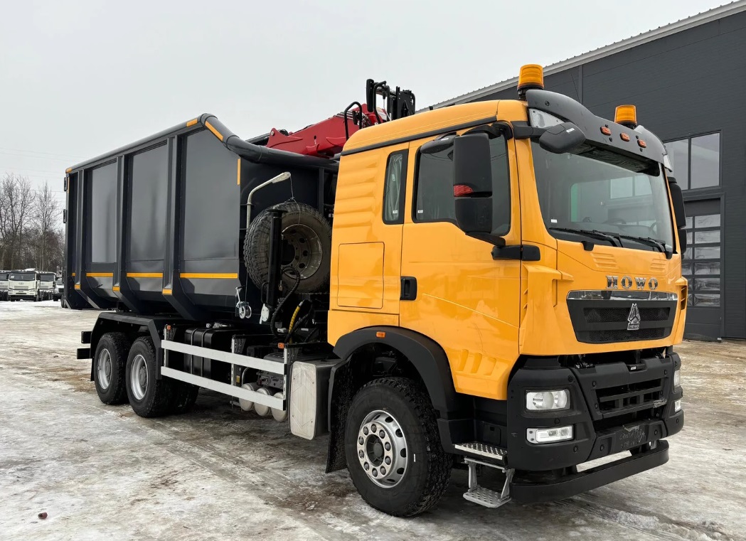Ломовоз Howo t5g КМУ велмаш 10-74М